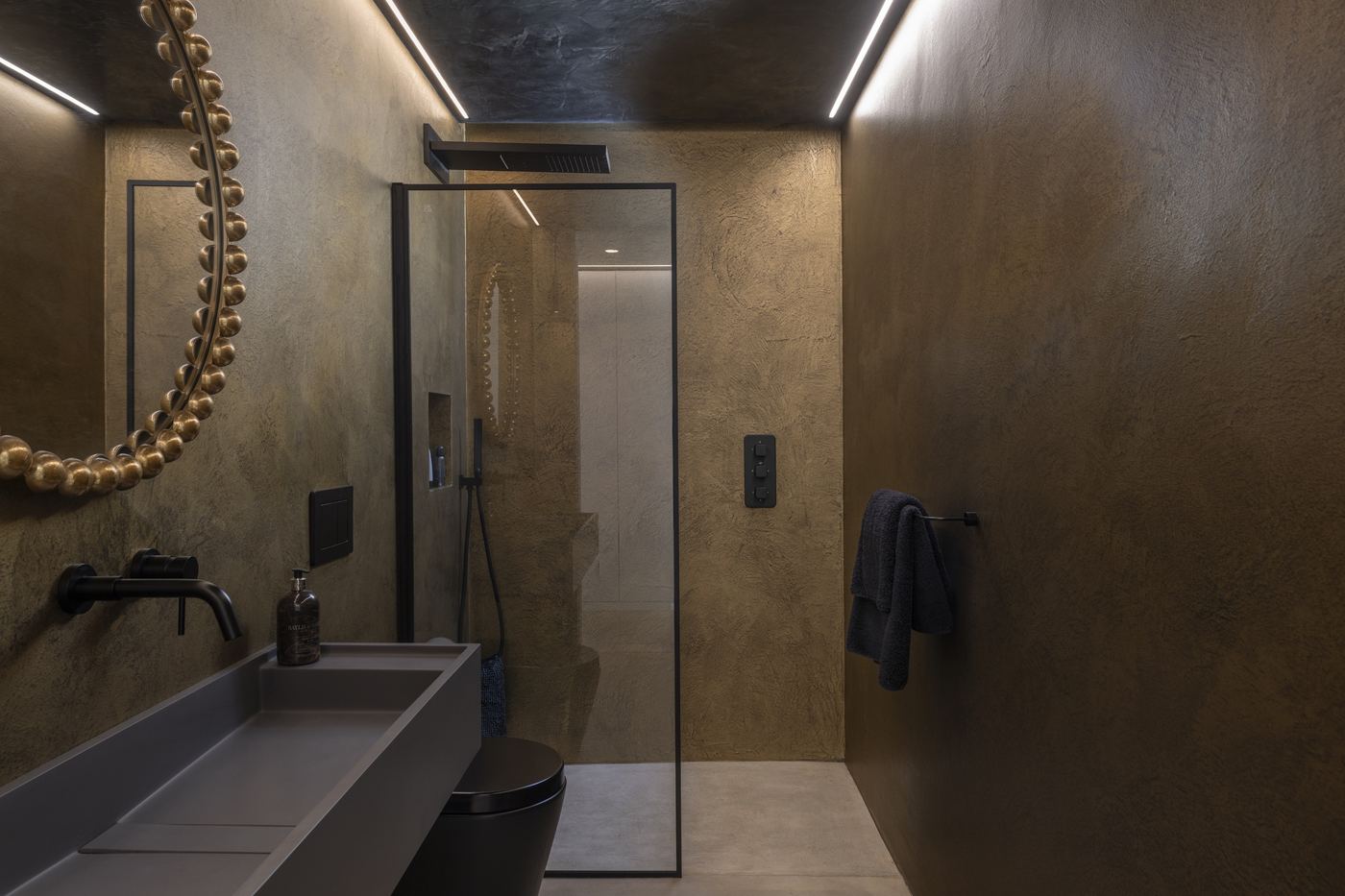Shower room with recessed LED ceiling strips